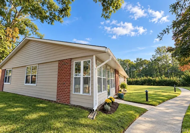 Photo 2 of Condo for sale at 38 Trent Ct #A, Brookhaven, NY 11961 | MLS# 1056983 | Listing updated on 2026-10-04