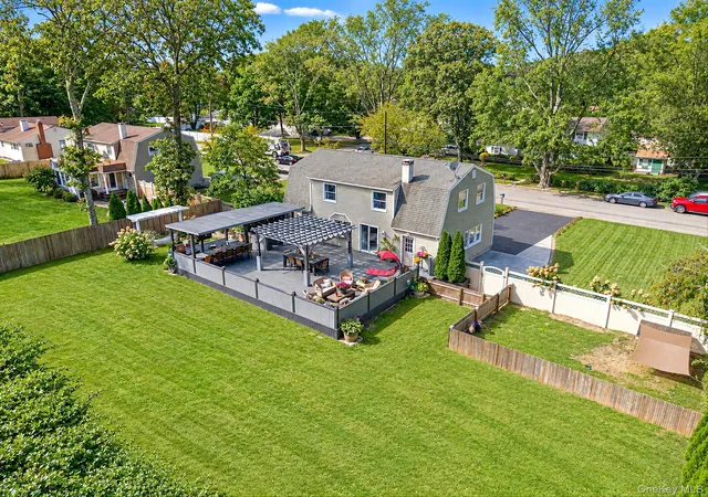 Photo 2 of Single family home for sale at 27 Wagner Dr, Brookhaven, NY 11727 | MLS# 1057019 | Listing updated on 2026-10-06