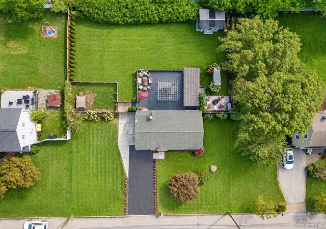 Photo 3 of Single family home for sale at 27 Wagner Dr, Brookhaven, NY 11727 | MLS# 1057019 | Listing updated on 2026-10-06