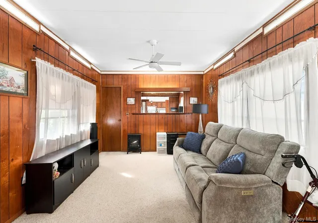 Photo 2 of Manufactured home for sale at 658 Sound Ave #E-12, Riverhead, NY 11933 | MLS# 1057267 | Listing updated on 2026-10-04