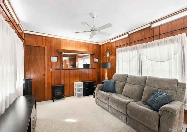 Photo 3 of Manufactured home for sale at 658 Sound Ave #E-12, Riverhead, NY 11933 | MLS# 1057267 | Listing updated on 2026-10-04