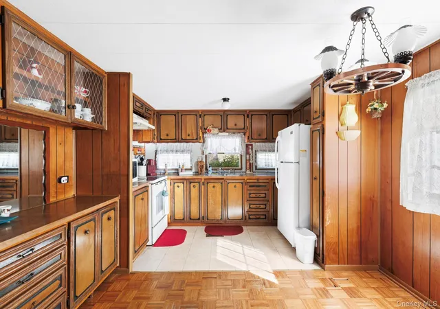 Photo 4 of Manufactured home for sale at 658 Sound Ave #E-12, Riverhead, NY 11933 | MLS# 1057267 | Listing updated on 2026-10-04