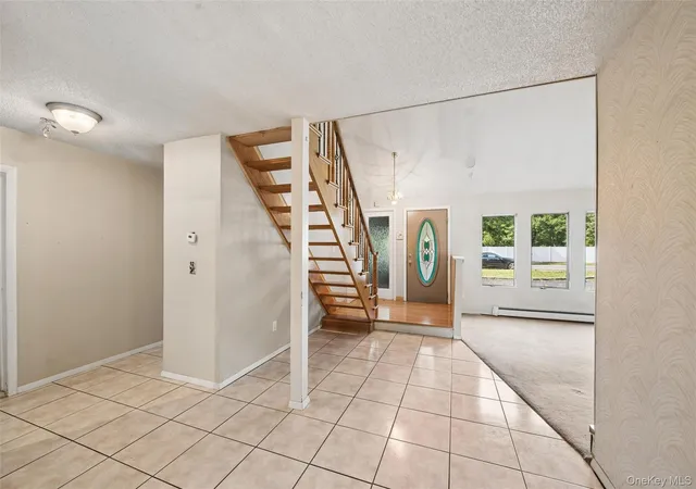 Photo 4 of Single family home for sale at 65 Morris Ave, Brookhaven, NY 11742 | MLS# 1057289 | Listing updated on 2026-10-01