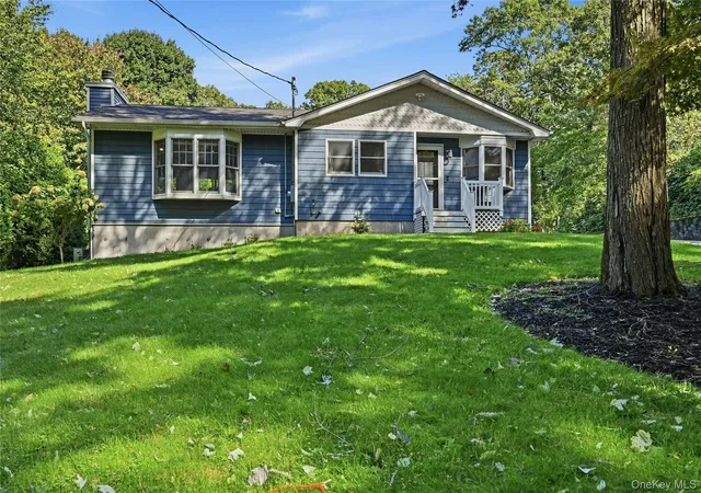 Photo 2 of Single family home for sale at 82 Oakwood Dr, Riverhead, NY 11792 | MLS# 1057309 | Listing updated on 2026-10-07