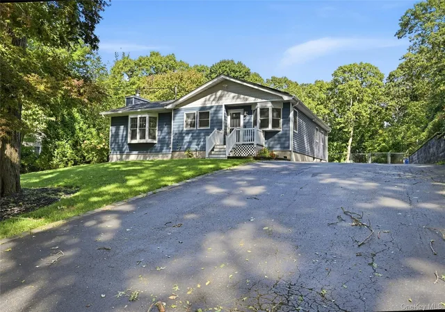Photo 3 of Single family home for sale at 82 Oakwood Dr, Riverhead, NY 11792 | MLS# 1057309 | Listing updated on 2026-10-07