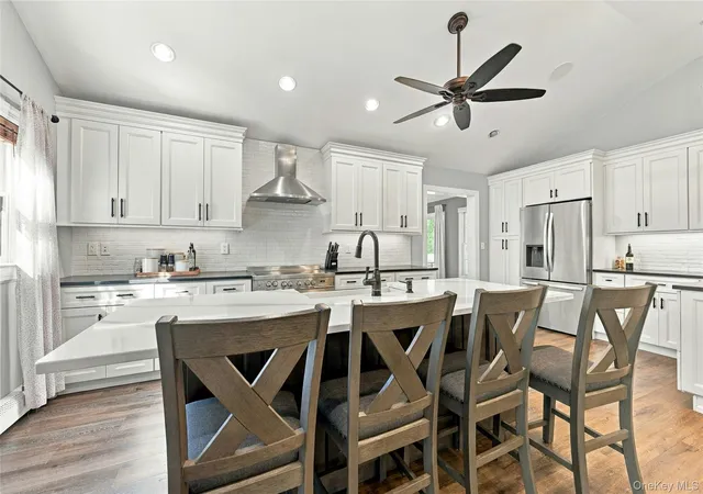 Photo 3 of Single family home for sale at 82 Oakwood Dr, Riverhead, NY 11792 | MLS# 1057309 | Listing updated on 2026-10-07