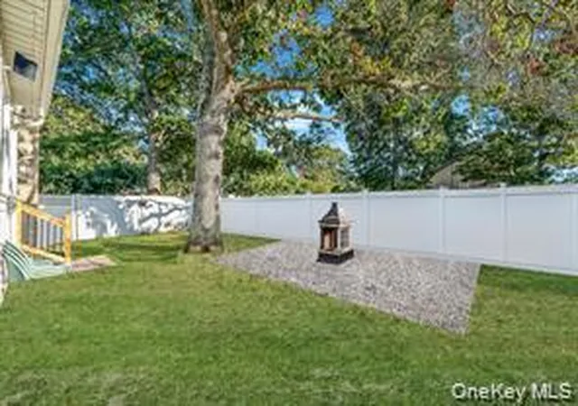 Photo 3 of Single family home for sale at 32 Pine Tree Dr, Brookhaven, NY 11967 | MLS# 1057350 | Listing updated on 2026-10-07