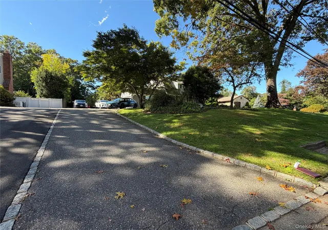 Photo 3 of Single family home for sale at 14 King Arthurs Ct E #14, Smithtown, NY 11780 | MLS# 1057367 | Listing updated on 2026-10-07