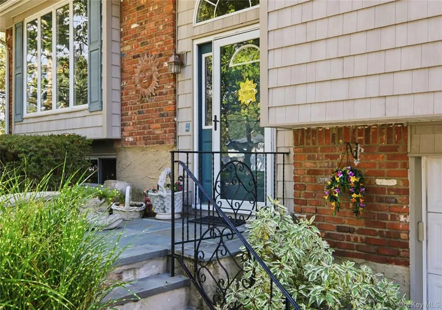 Photo 2 of Single family home for sale at 26 Pickwick Hl Dr, Huntington Station, NY 11746 | MLS# 1057394 | Listing updated on 2026-10-01