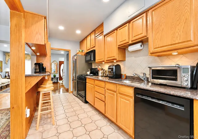 Photo 3 of Sale Pending at 53-31 210th Street, New York, NY 11364 | MLS# 1057498 | Listing updated on 2026-10-09