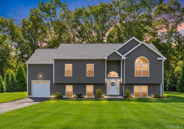 Photo 1 of Single family home for sale at 77 Maple Wood Ln, Riverhead, NY 11901 | MLS# 1057678 | Listing updated on 2026-10-01