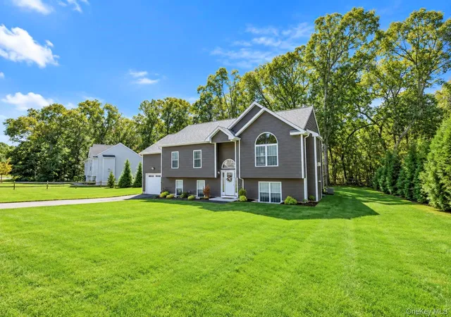 Photo 2 of Single family home for sale at 77 Maple Wood Ln, Riverhead, NY 11901 | MLS# 1057678 | Listing updated on 2026-10-01