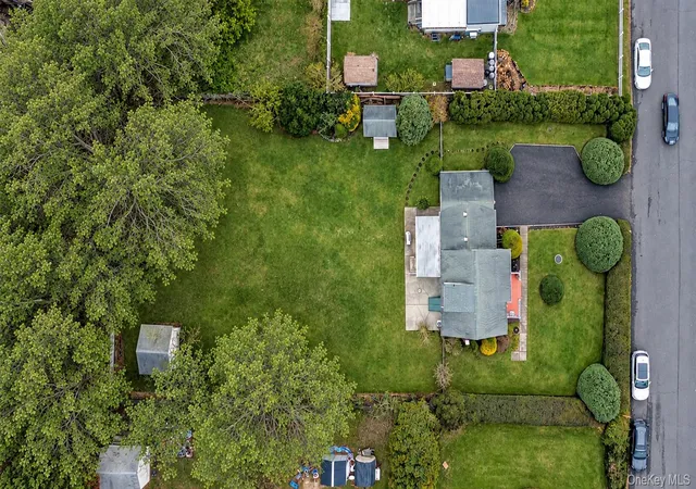 Photo 2 of Single family home for sale at 218 N Titmus Dr, Mastic, NY 11950 | MLS# 1057968 | Listing updated on 2026-10-08