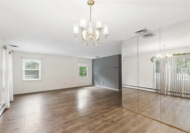 Photo 2 of Single family home for sale at 19 Wintergreen Dr, Brookhaven, NY 11727 | MLS# 1058074 | Listing updated on 2026-10-06