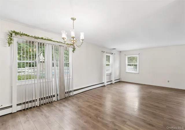 Photo 3 of Single family home for sale at 19 Wintergreen Dr, Brookhaven, NY 11727 | MLS# 1058074 | Listing updated on 2026-10-06