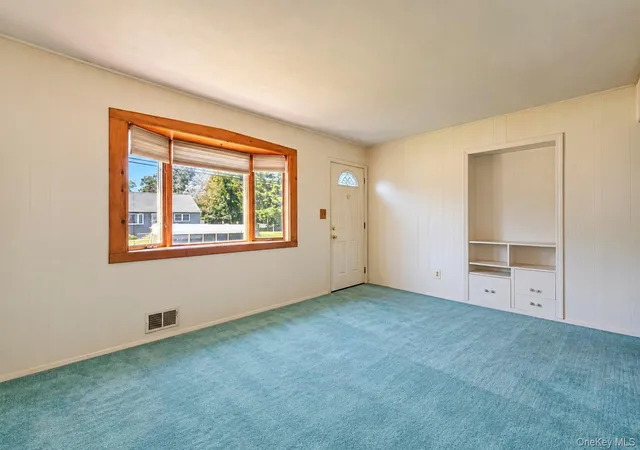 Photo 4 of Single family home for sale at 34 Midday Dr, Brookhaven, NY 11720 | MLS# 1058385 | Listing updated on 2026-10-08