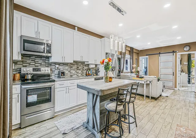 Photo 4 of Single family home for sale at 73 Lynbrook Dr, Brookhaven, NY 11951 | MLS# 1058554 | Listing updated on 2026-10-07