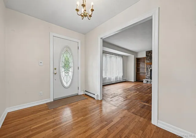 Photo 3 of Single family home for sale at 3 Alamo Dr, Brookhaven, NY 11738 | MLS# 1058567 | Listing updated on 2026-10-07