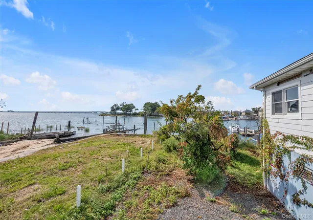 Photo 2 of Sale Pending at 99-63 Lockwood Ct, New York, NY 11414 | MLS# 1058595 | Listing updated on 2026-10-21
