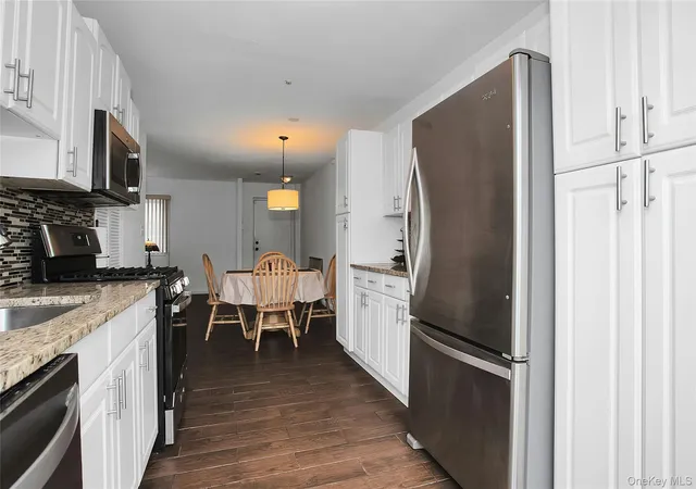 Photo 4 of House for sale at 94 Gauguin Ct #94, Brookhaven, NY 11953 | MLS# 1058597 | Listing updated on 2026-10-06