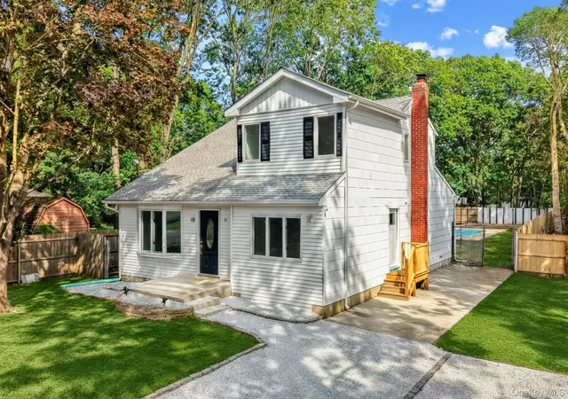 Photo 3 of Single family home for sale at 34 Pinelawn Ave, Shirley, NY 11967 | MLS# 1058861 | Listing updated on 2026-10-08