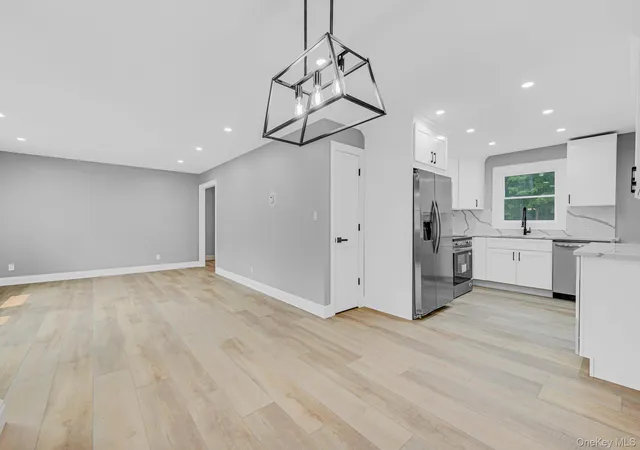 Photo 4 of Single family home for sale at 11 Mayfield Dr, Brookhaven, NY 11951 | MLS# 1059225 | Listing updated on 2026-10-07