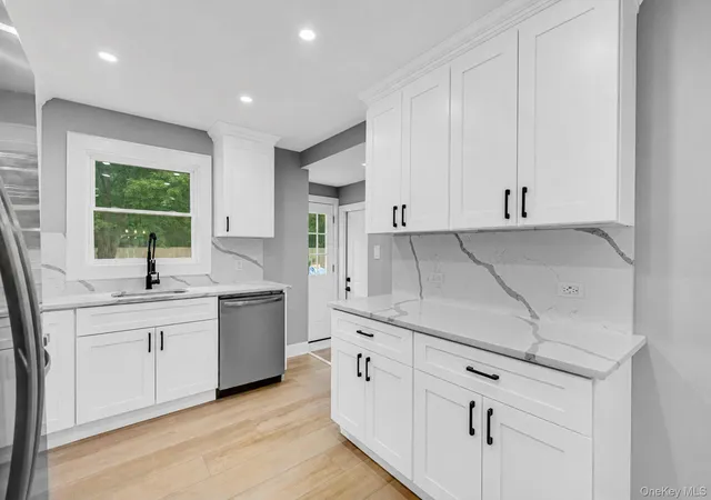 Photo 2 of Single family home for sale at 11 Mayfield Dr, Brookhaven, NY 11951 | MLS# 1059225 | Listing updated on 2026-10-07