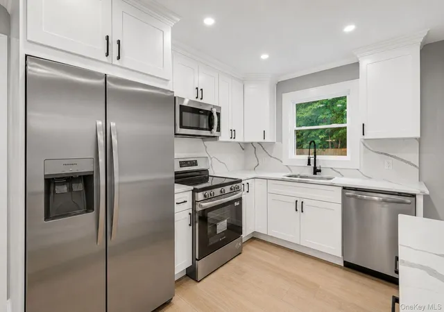 Photo 3 of Single family home for sale at 11 Mayfield Dr, Brookhaven, NY 11951 | MLS# 1059225 | Listing updated on 2026-10-07