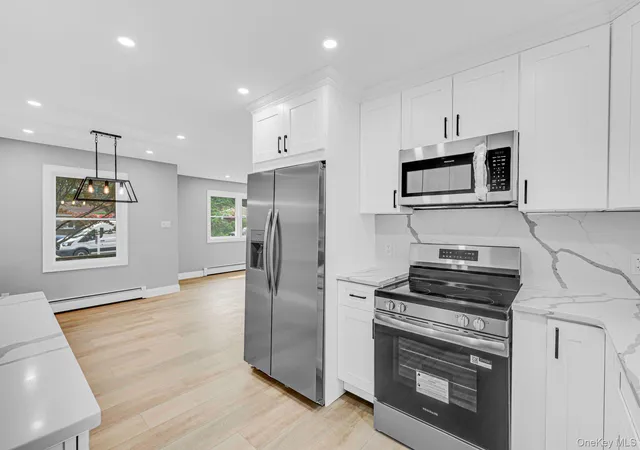 Photo 3 of Single family home for sale at 11 Mayfield Dr, Brookhaven, NY 11951 | MLS# 1059225 | Listing updated on 2026-10-07