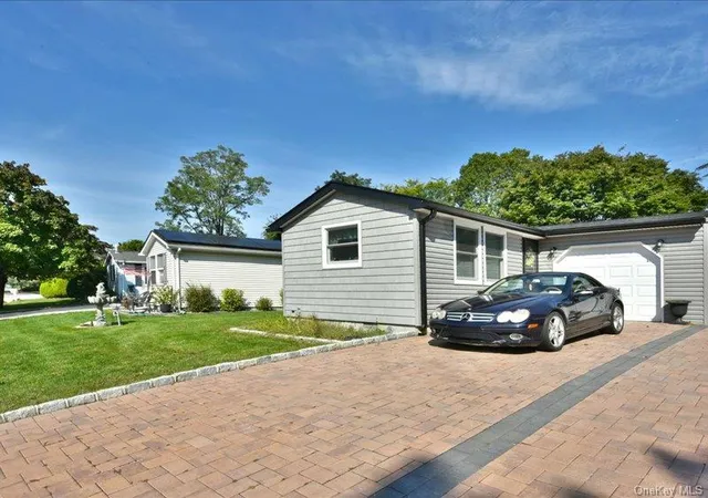 Photo 2 of Condo for sale at 10 Greenwood Blvd, Brookhaven, NY 11949 | MLS# 1059253 | Listing updated on 2026-10-07