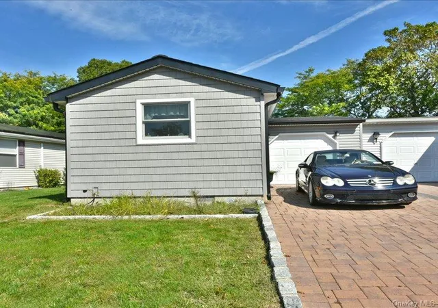 Photo 3 of Condo for sale at 10 Greenwood Blvd, Brookhaven, NY 11949 | MLS# 1059253 | Listing updated on 2026-10-07