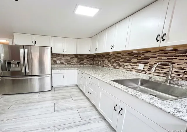 Photo 4 of Single family home for sale at 79 Moquette Row N, Yonkers, NY 10703 | MLS# 1059261 | Listing updated on 2026-10-08