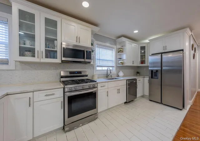 Photo 3 of Multi family home for sale at 116 01 221, New York, NY 11411 | MLS# 1059279 | Listing updated on 2026-10-10