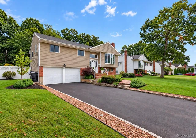 Photo 2 of Single family home for sale at 31 Sterling Ln, Smithtown, NY 11787 | MLS# 1059410 | Listing updated on 2026-10-09