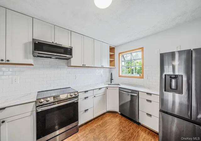 Photo 3 of Single family home for sale at 24 Trafalgar Dr, Shirley, NY 11967 | MLS# 1059794 | Listing updated on 2026-10-07