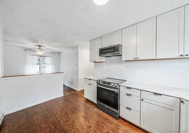 Photo 4 of Single family home for sale at 24 Trafalgar Dr, Shirley, NY 11967 | MLS# 1059794 | Listing updated on 2026-10-08
