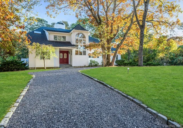 Photo 2 of Single family home for sale at 19 Bay Woods Dr, Hampton Bays, NY 11946 | MLS# 1059857 | Listing updated on 2026-10-07