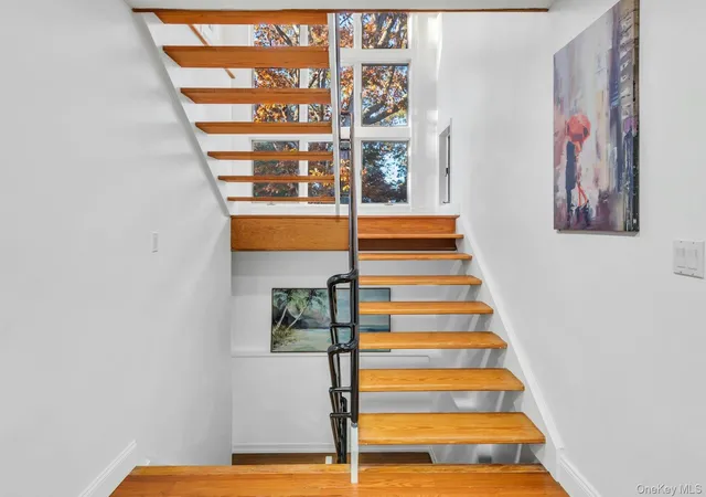 Photo 4 of Single family home for sale at 19 Bay Woods Dr, Hampton Bays, NY 11946 | MLS# 1059857 | Listing updated on 2026-10-07