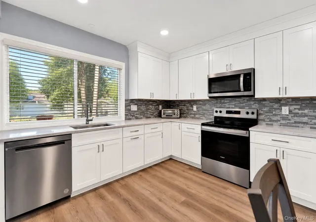 Photo 2 of Single family home for sale at 1012 Old Medford Ave, Brookhaven, NY 11738 | MLS# 1059967 | Listing updated on 2026-10-08