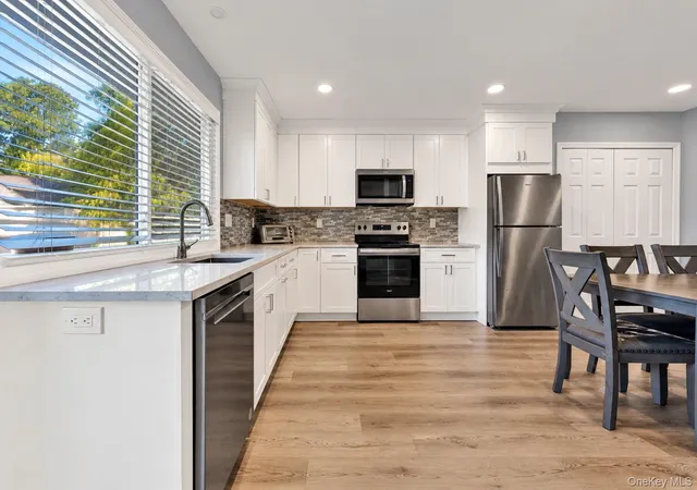 Photo 3 of Single family home for sale at 1012 Old Medford Ave, Brookhaven, NY 11738 | MLS# 1059967 | Listing updated on 2026-10-08