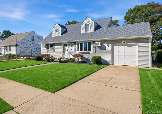 Photo 3 of Single family home for sale at 305 W Nicholai St, Hicksville, NY 11801 | MLS# 1060113 | Listing updated on 2026-10-08