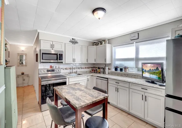 Photo 4 of Single family home for sale at 53 Spindle Rd, Hicksville, NY 11801 | MLS# 1060126 | Listing updated on 2026-10-09