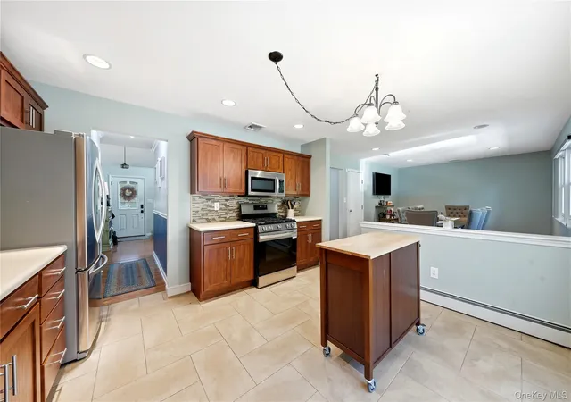 Photo 3 of Single family home for sale at 50 Timber Ridge Dr, Coram, NY 11727 | MLS# 1060138 | Listing updated on 2026-10-13