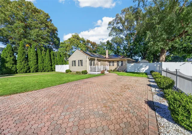 Photo 3 of Single family home for sale at 143 Smithtown Polk Blvd, Centereach, NY 11720 | MLS# 1060234 | Listing updated on 2026-10-08