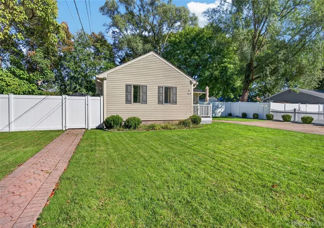 Photo 3 of Single family home for sale at 143 Smithtown Polk Blvd, Centereach, NY 11720 | MLS# 1060234 | Listing updated on 2026-10-09