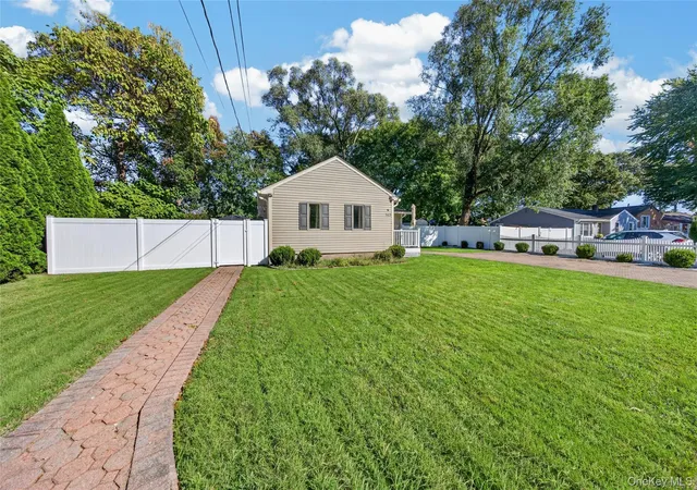 Photo 4 of Single family home for sale at 143 Smithtown Polk Blvd, Centereach, NY 11720 | MLS# 1060234 | Listing updated on 2026-10-09