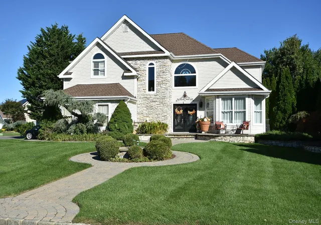 Photo 2 of Single family home for sale at 112 Summerfield Dr, Brookhaven, NY 11742 | MLS# 1060499 | Listing updated on 2026-10-24