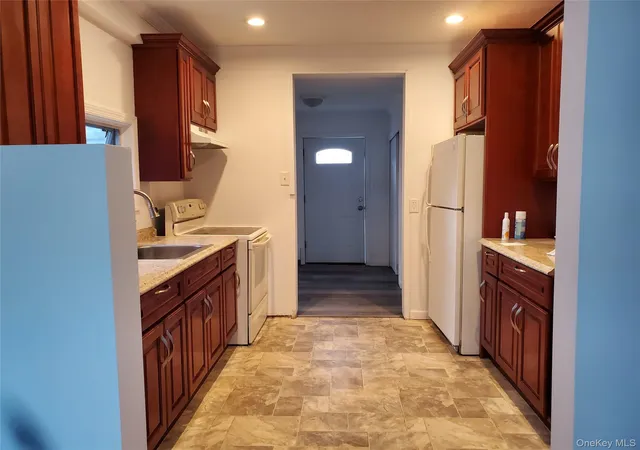 Photo 4 of Single family home for sale at 12 W Narcissus Rd, Mastic Beach, NY 11951 | MLS# 1060753 | Listing updated on 2026-10-10