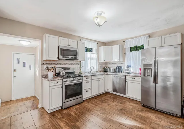 Photo 2 of Single family home for sale at 60 S Evergreen Dr, Brookhaven, NY 11784 | MLS# 1060946 | Listing updated on 2026-10-10