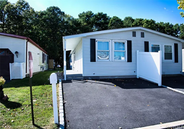 Photo 1 of Manufactured home for sale at 65a Village Green Cir W, Brookhaven, NY 11949 | MLS# 1061085 | Listing updated on 2026-10-10